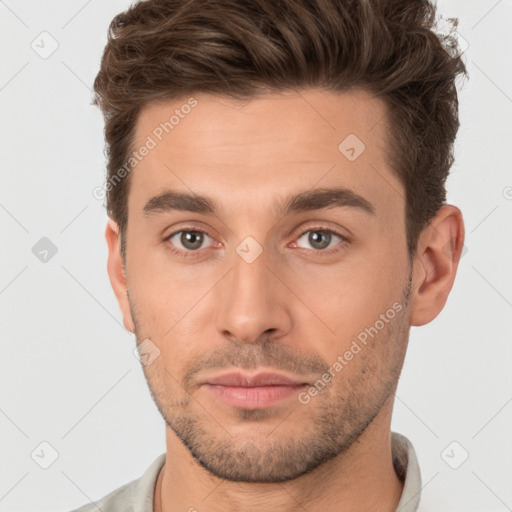 Neutral white young-adult male with short  brown hair and brown eyes