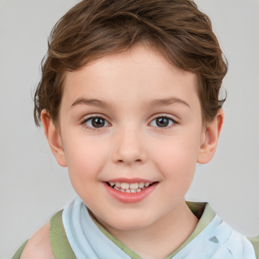 Joyful white child female with short  brown hair and brown eyes