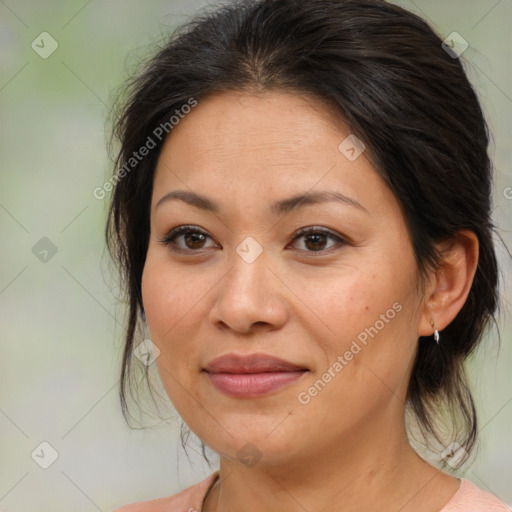 Joyful white adult female with medium  brown hair and brown eyes