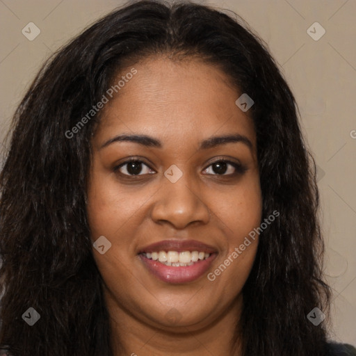 Joyful black young-adult female with long  brown hair and brown eyes