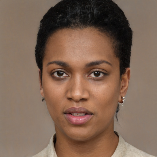 Neutral black young-adult female with short  black hair and brown eyes