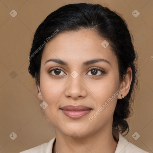 Joyful latino young-adult female with medium  brown hair and brown eyes