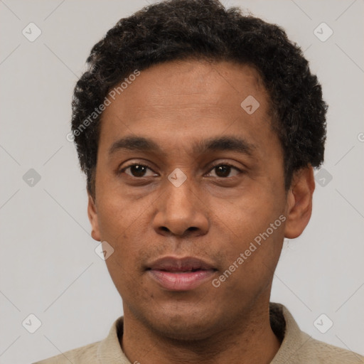 Neutral black adult male with short  black hair and brown eyes