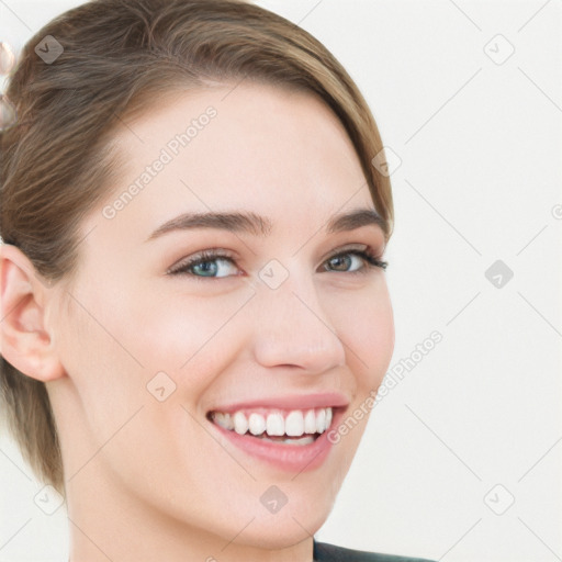 Joyful white young-adult female with medium  brown hair and blue eyes