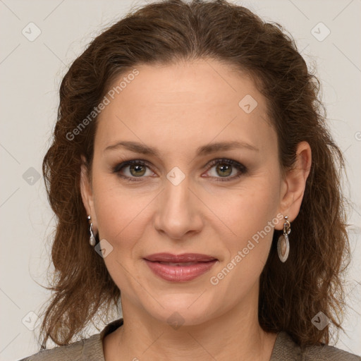 Joyful white young-adult female with long  brown hair and green eyes