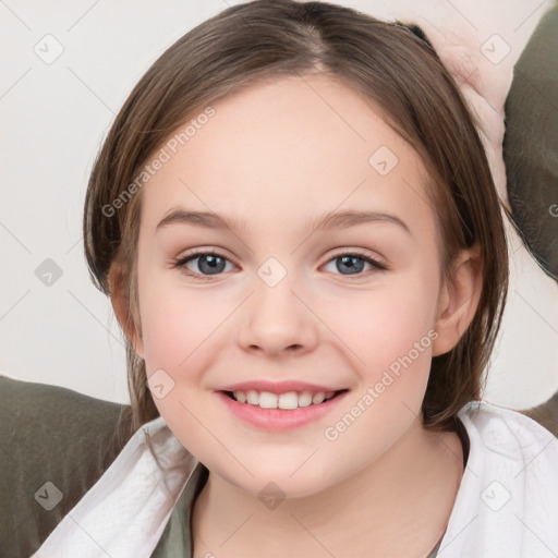 Joyful white child female with medium  brown hair and brown eyes