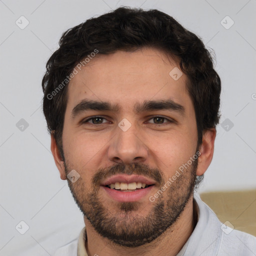 Joyful white young-adult male with short  black hair and brown eyes