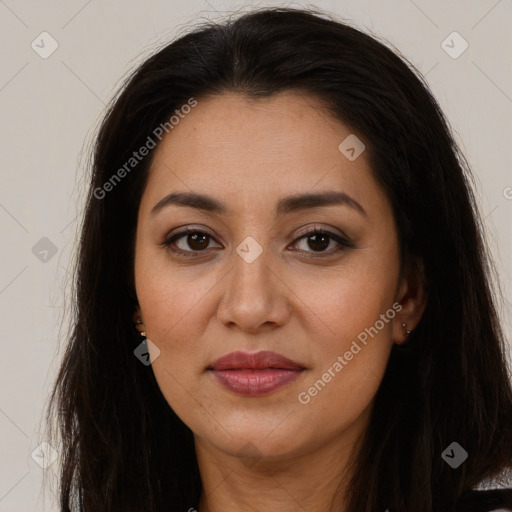 Joyful latino young-adult female with long  brown hair and brown eyes