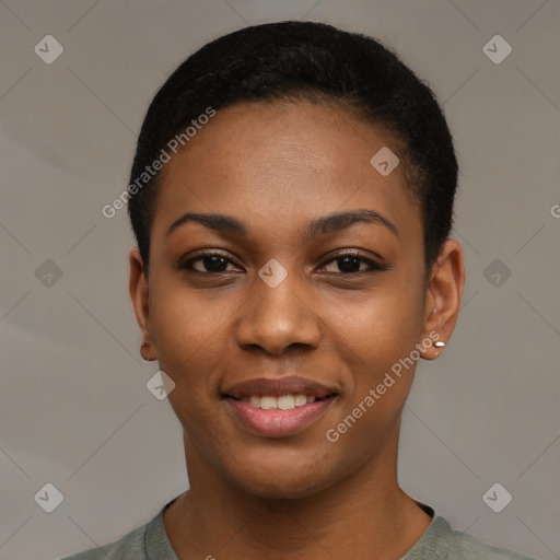 Joyful black young-adult female with short  black hair and brown eyes