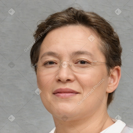 Joyful white adult female with short  brown hair and brown eyes