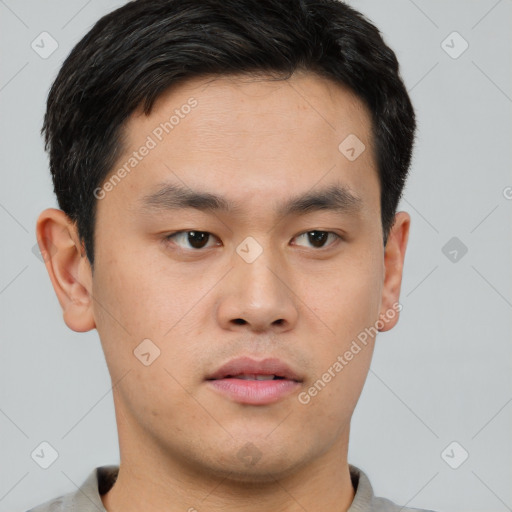 Neutral asian young-adult male with short  brown hair and brown eyes