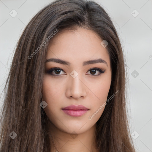 Neutral white young-adult female with long  brown hair and brown eyes