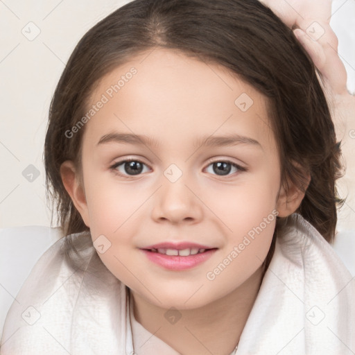 Joyful white child female with medium  brown hair and brown eyes