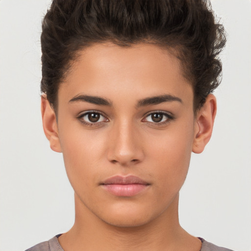 Neutral white young-adult female with short  brown hair and brown eyes