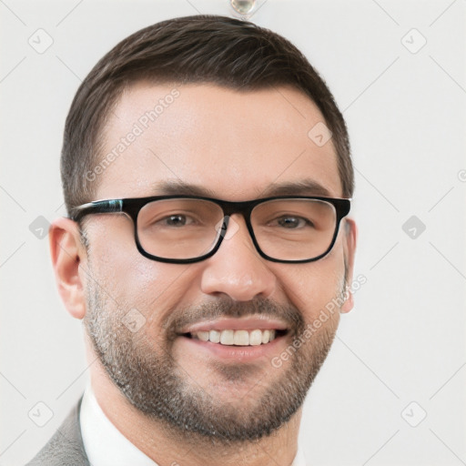 Joyful white young-adult male with short  brown hair and grey eyes