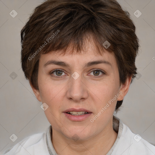 Joyful white adult female with short  brown hair and brown eyes