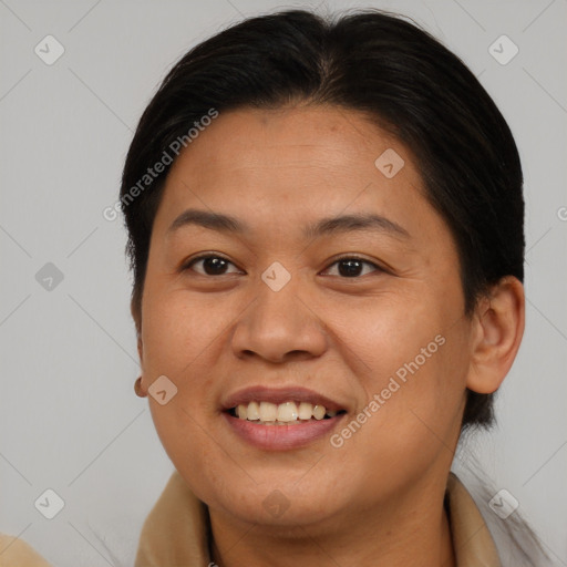 Joyful asian young-adult female with short  brown hair and brown eyes