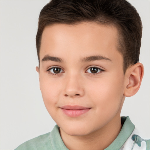 Joyful white child female with short  brown hair and brown eyes