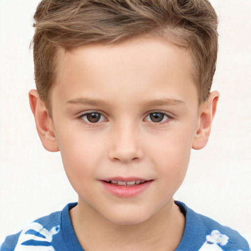 Joyful white child male with short  brown hair and brown eyes