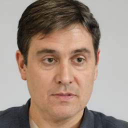 Neutral white adult male with short  brown hair and brown eyes