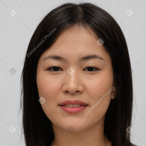 Joyful asian young-adult female with long  brown hair and brown eyes