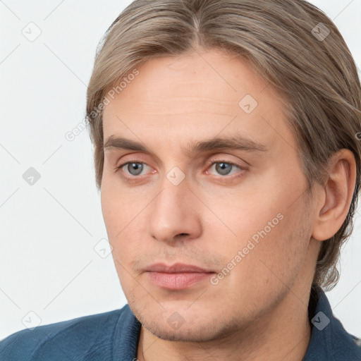 Joyful white young-adult male with medium  brown hair and brown eyes