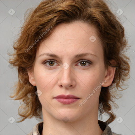 Joyful white young-adult female with medium  brown hair and green eyes