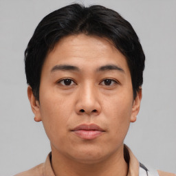 Neutral asian young-adult male with short  brown hair and brown eyes