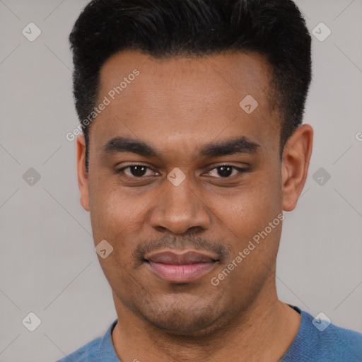 Joyful latino young-adult male with short  black hair and brown eyes