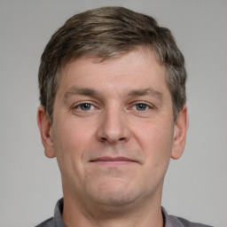 Neutral white young-adult male with short  brown hair and grey eyes