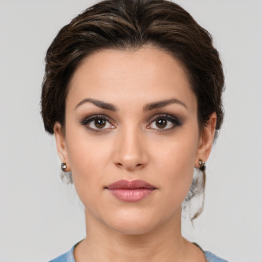Neutral white young-adult female with medium  brown hair and brown eyes