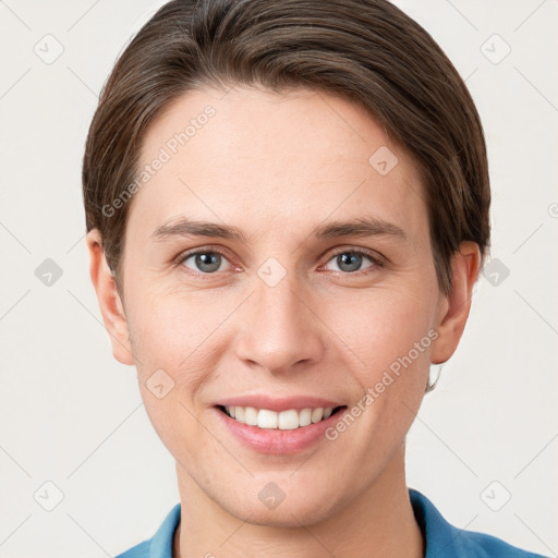 Joyful white young-adult female with short  brown hair and grey eyes