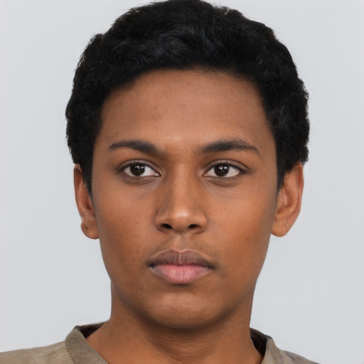 Neutral black young-adult male with short  black hair and brown eyes