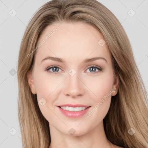 Joyful white young-adult female with long  brown hair and grey eyes