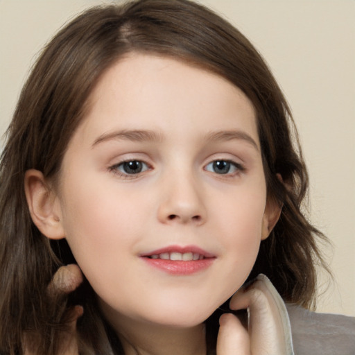 Neutral white child female with long  brown hair and brown eyes