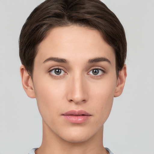 Neutral white young-adult female with short  brown hair and brown eyes