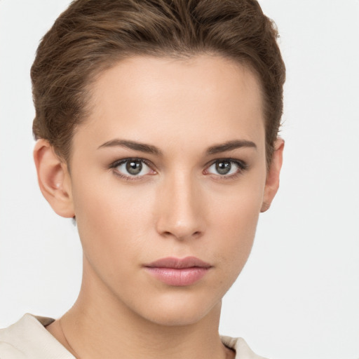 Neutral white young-adult female with short  brown hair and brown eyes