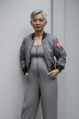 Singaporean middle-aged non-binary with  gray hair