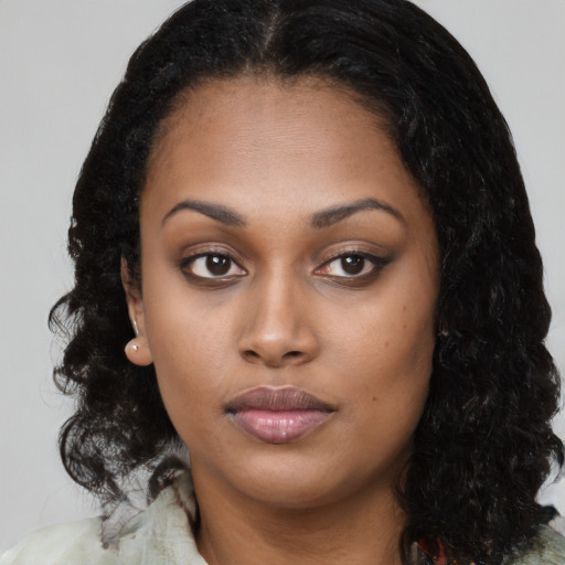 Neutral black young-adult female with long  black hair and brown eyes