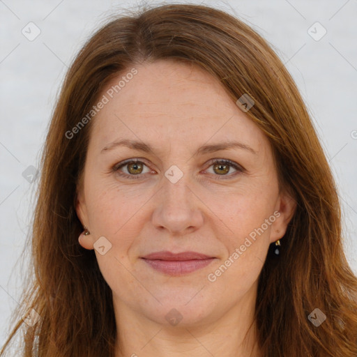 Joyful white adult female with long  brown hair and brown eyes