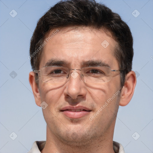 Joyful white adult male with short  brown hair and brown eyes