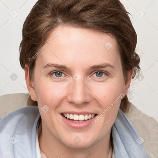 Joyful white young-adult female with medium  brown hair and blue eyes