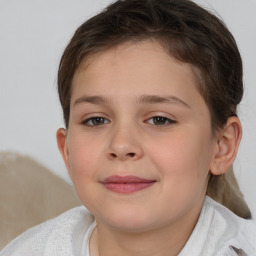 Joyful white child female with short  brown hair and brown eyes