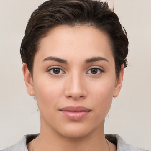 Neutral white young-adult female with short  brown hair and brown eyes