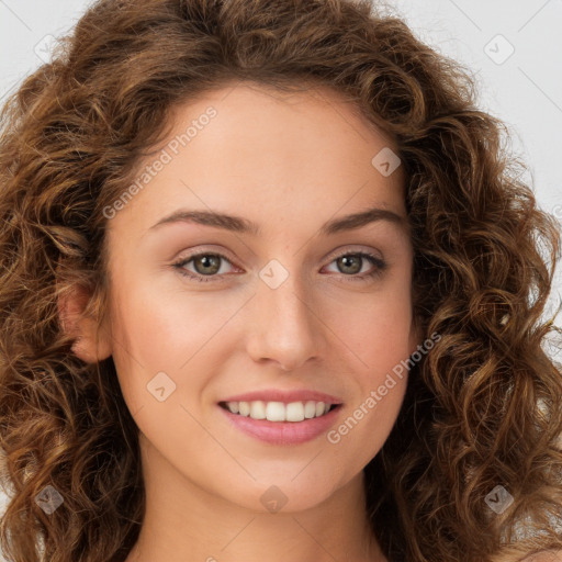 Joyful white young-adult female with long  brown hair and green eyes