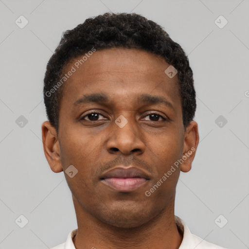 Neutral black young-adult male with short  brown hair and brown eyes
