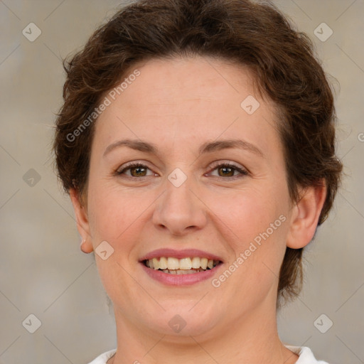 Joyful white young-adult female with medium  brown hair and green eyes