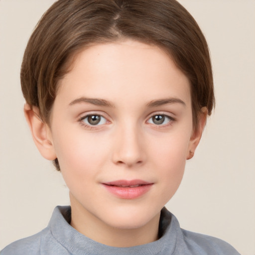 Joyful white child female with short  brown hair and brown eyes