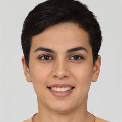 Joyful white young-adult female with short  brown hair and brown eyes