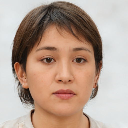 Neutral white young-adult female with medium  brown hair and brown eyes